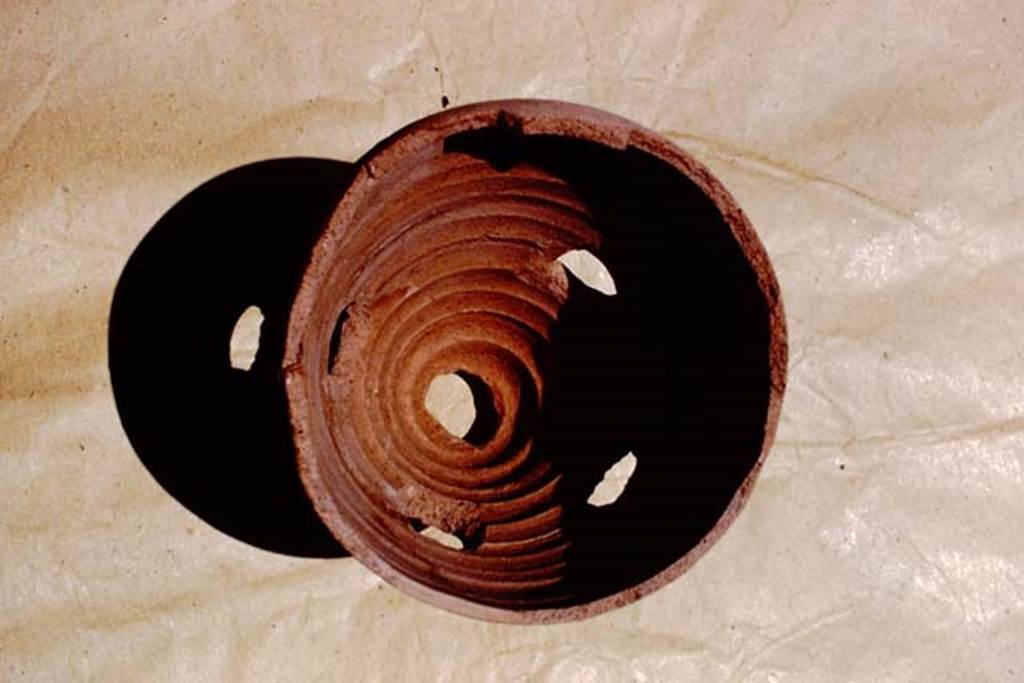I.15.3 Pompeii, 1973. Detail of terracotta pot. Photo by Stanley A. Jashemski.  
Source: The Wilhelmina and Stanley A. Jashemski archive in the University of Maryland Library, Special Collections (See collection page) and made available under the Creative Commons Attribution-Non Commercial License v.4. See Licence and use details. J73f0193