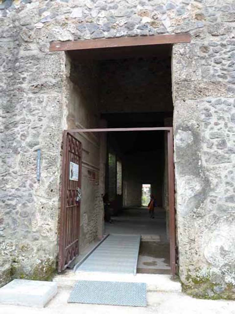 I.15.3 Pompeii. May 2010. Entrance doorway and fauces room 5.
The house was named after the graffito wall painting found on the north wall of the peristyle.
The painting showed a ship with the inscription “Europa”.