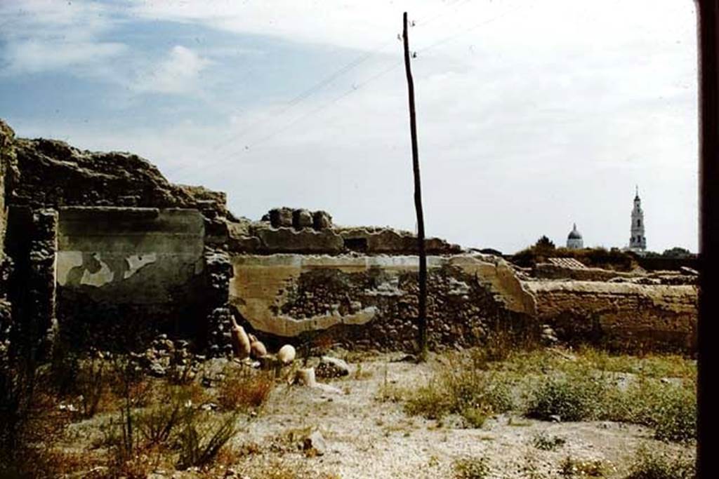 I.16.2 Pompeii. 1959. Looking east towards north-east corner of garden area, and remains of two rooms. Photo by Stanley A. Jashemski.
Source: The Wilhelmina and Stanley A. Jashemski archive in the University of Maryland Library, Special Collections (See collection page) and made available under the Creative Commons Attribution-Non Commercial License v.4. See Licence and use details.
J59f0499