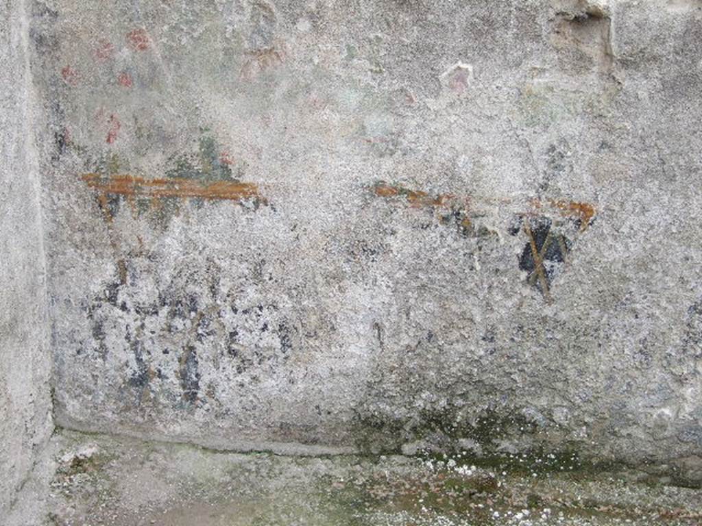 I.16.3 Pompeii. December 2006. Remains of garden painting on south wall of rectangular area, garden or pool?