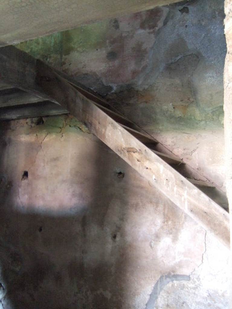 I.17.4 Pompeii.  May 2006. Open area or yard on south side of peristyle garden.  Reconstructed stairs against south wall.