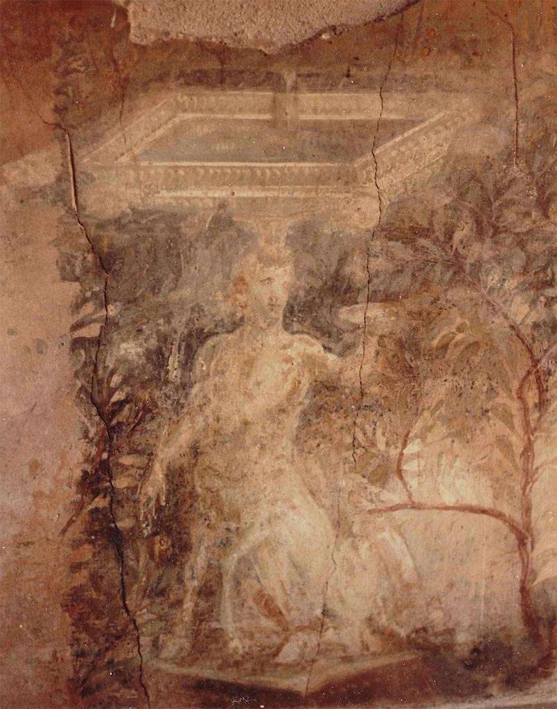I.17.4 Pompeii. 1984. Garden painting at west end of north wall of peristyle garden. A centaur supports a square fountain.
Photo courtesy of Espen B Andersson.
