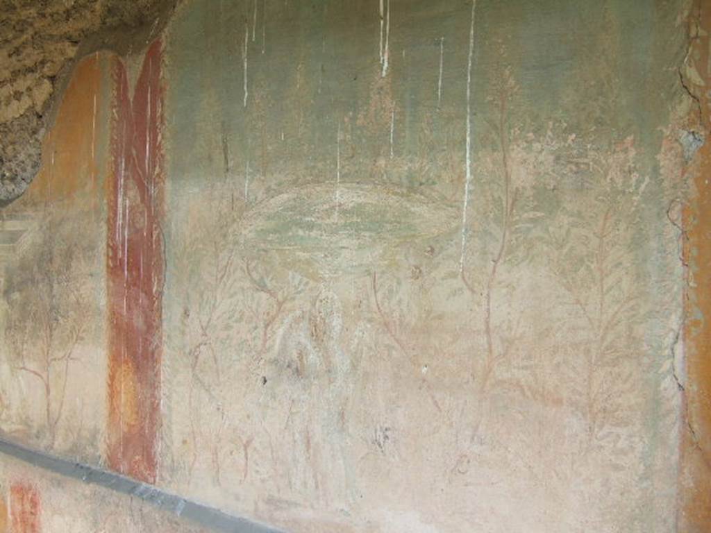 I.17.4 Pompeii.  May 2006. Garden painting on central panel at west end of north wall of peristyle garden.  A circular fountain supported by winged sphinxes. See Jashemski, W. F., 1993. The Gardens of Pompeii, Volume II: Appendices. New York: Caratzas. (p.328).