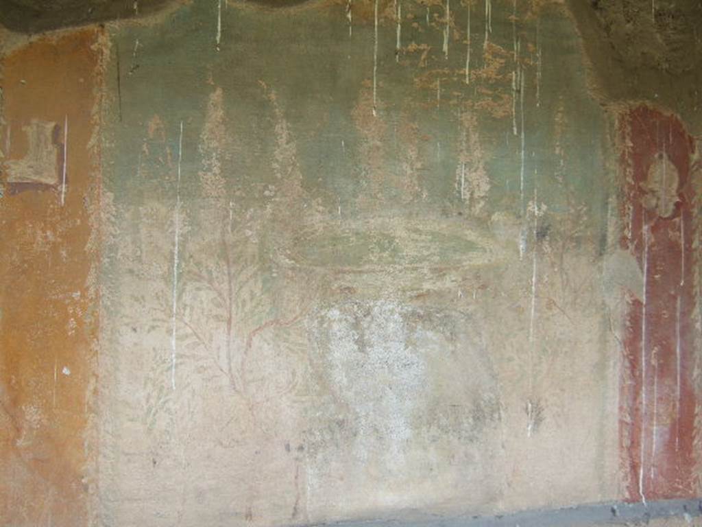 I.17.4 Pompeii.  May 2006. Garden painting on central panel at east end of north wall of peristyle garden. A circular fountain supported by winged sphinxes. See Jashemski, W. F., 1993. The Gardens of Pompeii, Volume II: Appendices. New York: Caratzas. (p.328).
