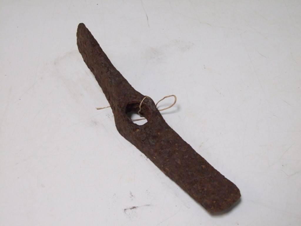 I.17.4 Pompeii.  March 2009.  Iron pick-axe.   Found in 1955.   SAP Inventory number: 11087A.