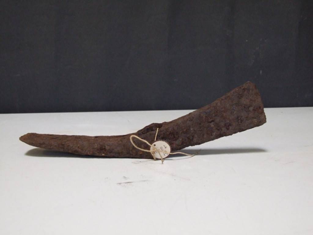 I.17.4 Pompeii.  March 2009.  Iron pick-axe.   Found in 1955.   SAP Inventory number: 11087A.