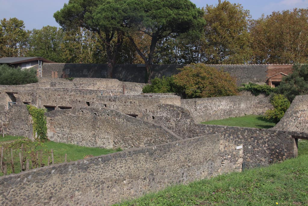 I.20.1 Pompeii. October 2023. 
Looking towards east wall of garden in south-east corner, with Via di Nocera near Nocera Gate, on right. Photo courtesy of Klaus Heese.