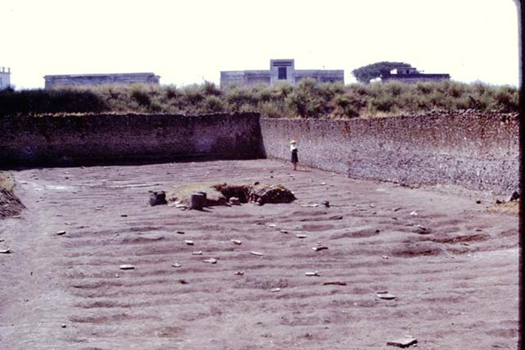 I.21.6 Pompeii, 1973. Looking towards triclinium and south-west corner. Photo by Stanley A. Jashemski. 
Source: The Wilhelmina and Stanley A. Jashemski archive in the University of Maryland Library, Special Collections (See collection page) and made available under the Creative Commons Attribution-Non Commercial License v.4. See Licence and use details. J73f0662