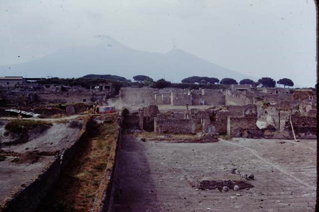 I.21.6 Pompeii, on right. 1974. Looking north along west side, with Vicolo della Nave Europa, ( centre left). Photo by Stanley A. Jashemski.   
Source: The Wilhelmina and Stanley A. Jashemski archive in the University of Maryland Library, Special Collections (See collection page) and made available under the Creative Commons Attribution-Non Commercial License v.4. See Licence and use details. J74f0347
