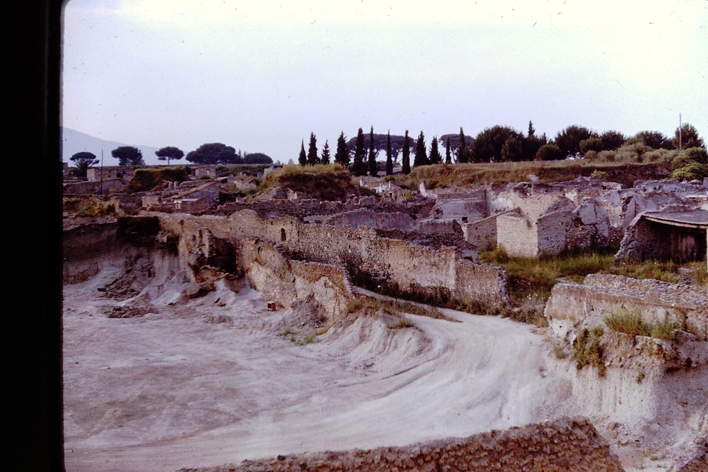 I.21.6 Pompeii. 1961. 
Looking north-east from the still-being excavated I.21.6 towards I.20.1, right of centre. Photo by Stanley A. Jashemski.
Source: The Wilhelmina and Stanley A. Jashemski archive in the University of Maryland Library, Special Collections (See collection page) and made available under the Creative Commons Attribution-Non-Commercial License v.4. See Licence and use details.
J61f0738