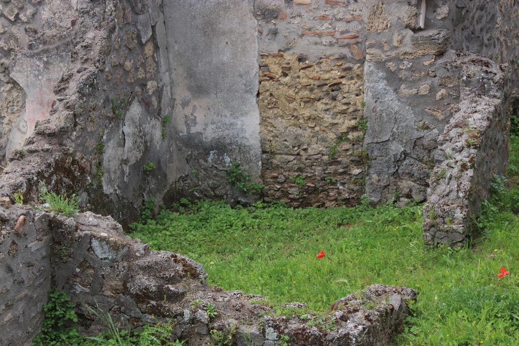 I.22.3 Pompeii. May 2024. West wall of room on east side of triclinium. Photo courtesy of Klaus Heese.