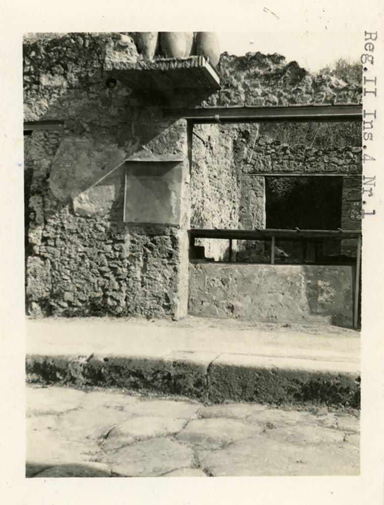 II.1.1 Pompeii but shown as II.4.1 on the photo. Pre-1937-39. East side of entrance doorway.
Photo courtesy of American Academy in Rome, Photographic Archive. Warsher collection no. 1876.