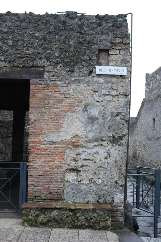 II.1.1 Pompeii. December 2018. 
Bench outside II.1.1 on west side of entrance. Photo courtesy of Aude Durand.