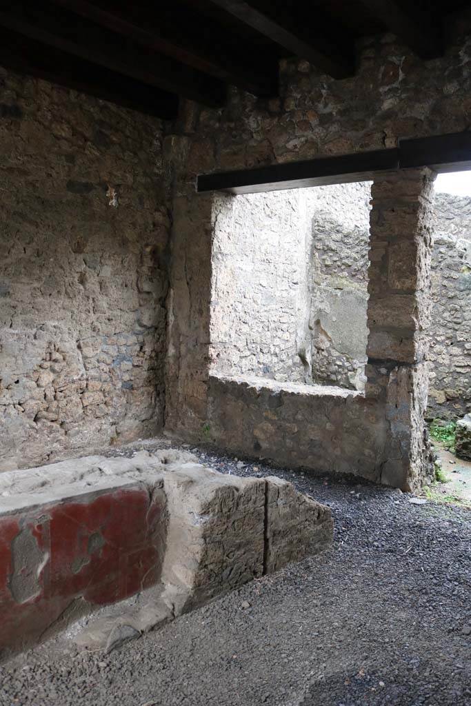 II.1.1 Pompeii. December 2018. 
Looking south-east across counter towards window in south wall. Photo courtesy of Aude Durand.
