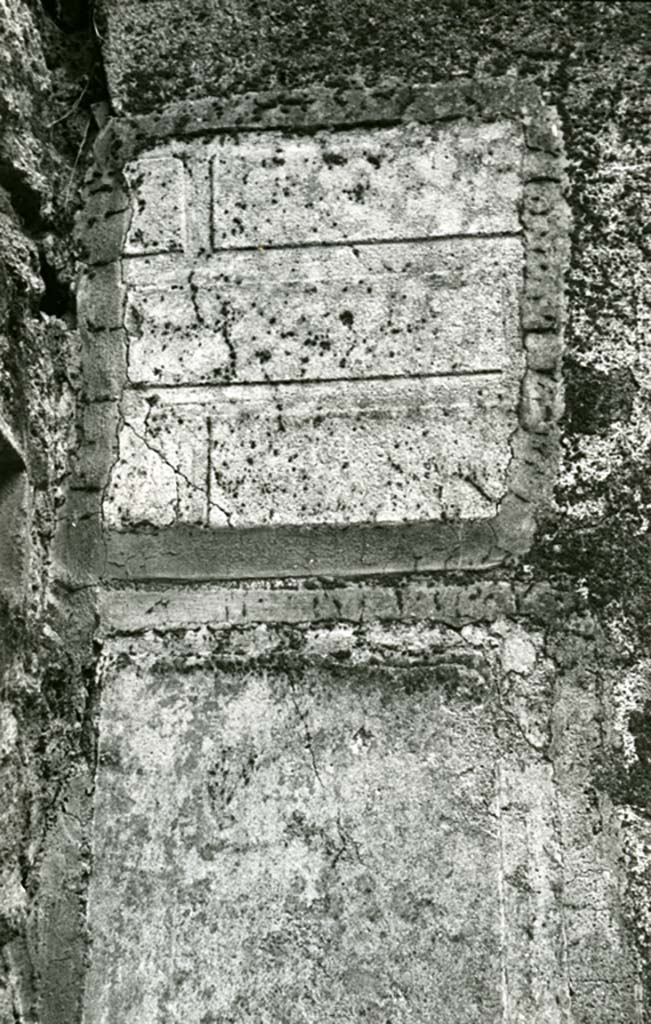 II.1.11/12 Pompeii. 1974. 
House, oblong room SW of peristyle, N wall by NW corner, detail. Photo courtesy of Anne Laidlaw.
American Academy in Rome, Photographic Archive. Laidlaw collection _P_74_1_32.