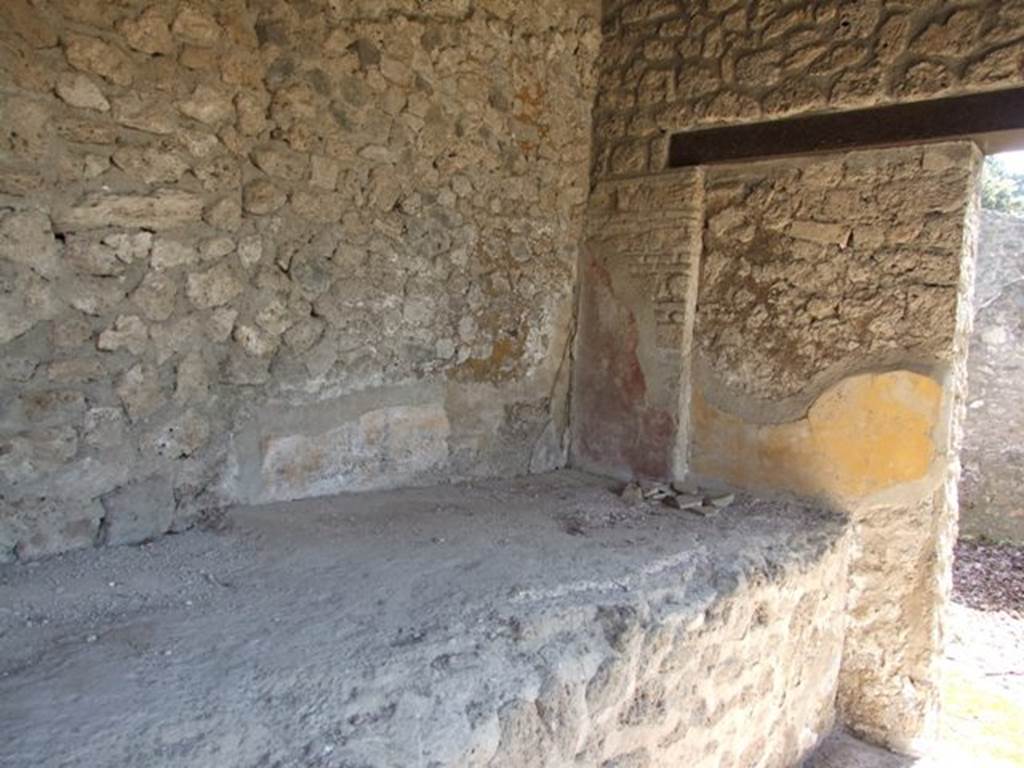 II.1.12 Pompeii. March 2009. South-east corner of podium or bench in sacellum.
According to Wilhelmina, “A large, high, red podium that extended across the width of the room stood against the rear wall. This has been variously explained as a podium for a statue, and a couch for a Sibyl.”
See Jashemski, W. F., 1979. The Gardens of Pompeii. New York: Caratzas. (p.135)