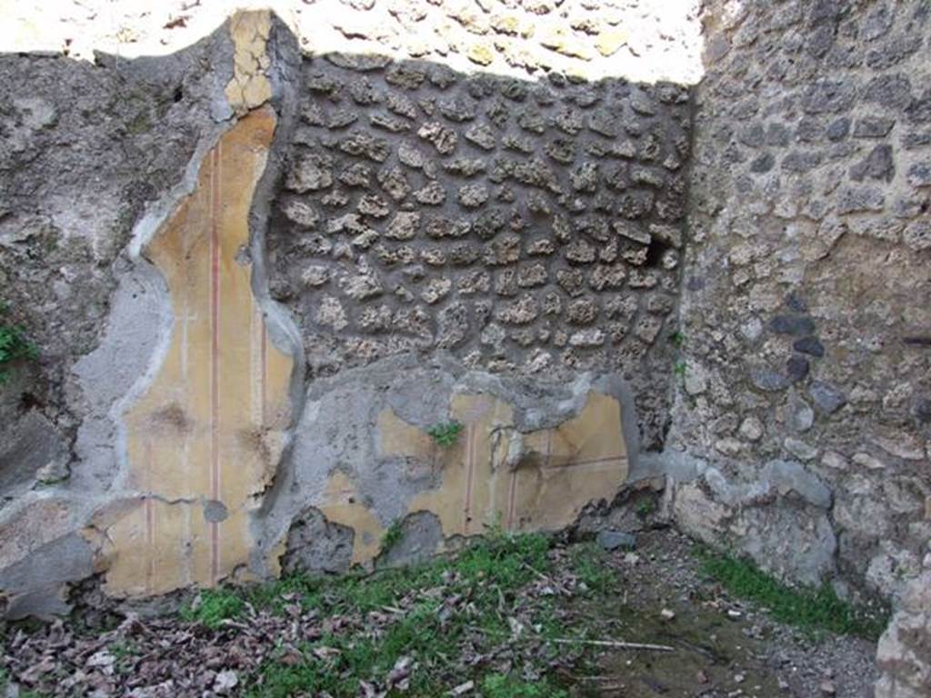II.1.12 Pompeii. March 2009. North-east corner of small room or storeroom on the north side of the sacellum.