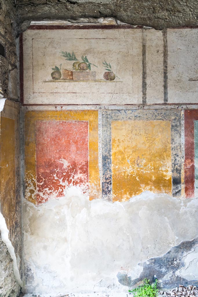 II.1.12 Pompeii. July 2021. 
Triclinium, painted panels from south wall at east end. Photo courtesy of Johannes Eber.