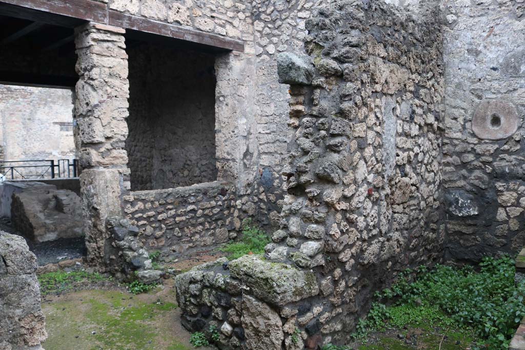 II.1.13 Pompeii. December 2018. 
Looking north-east across corridor towards doorway and window into bar-room, on left, and two other rooms, one in centre and kitchen, on right. 
Photo courtesy of Aude Durand.