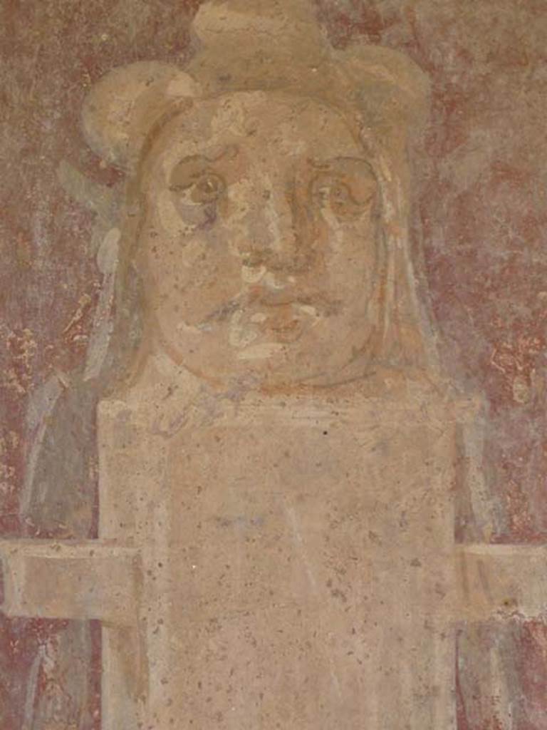 II.2.2 Pompeii. May 2011. Room “i”, detail of wall painting of herm on north wall of upper euripus, on east side of “myths” room doorway. 
Photo courtesy of Buzz Ferebee.