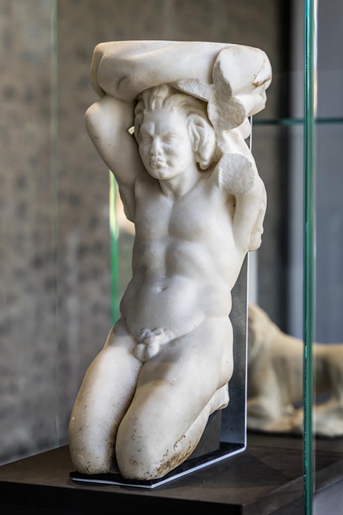 II.2.2 Pompeii. January 2023. 
Room “k”, kneeling Telamon in the form of a kneeling satyr. 
On display in exhibition in Palaestra. Photo courtesy of Johannes Eber.