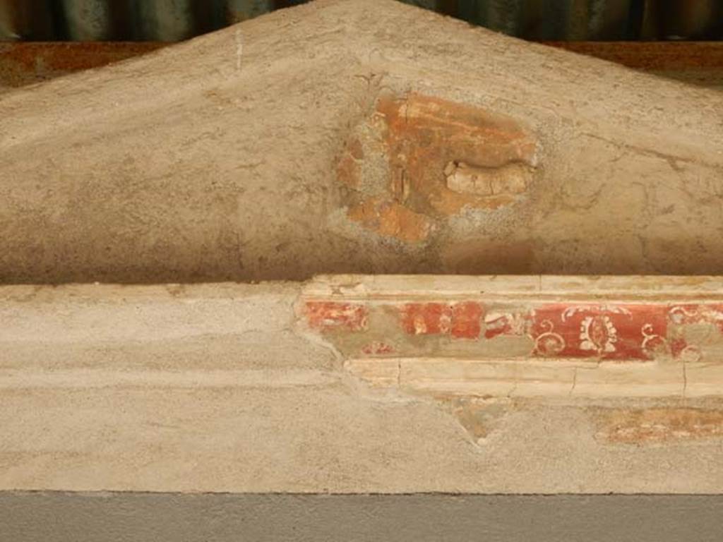 II.2.2 Pompeii. May 2016. Room “l”, garden area. Detail of decoration from north side of temple. 
Photo courtesy of Buzz Ferebee.