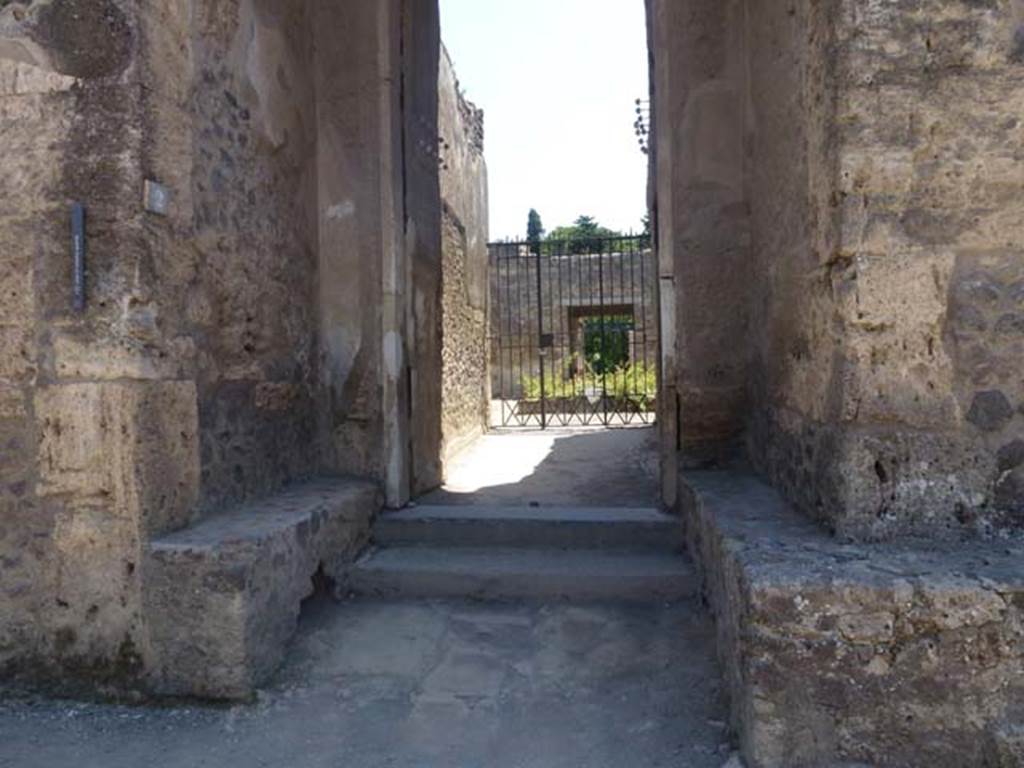 II.2.2 Pompeii. June 2012. Looking south towards entrance vestibule 1 and corridor, with benches on either side.
Photo courtesy of Michael Binns.