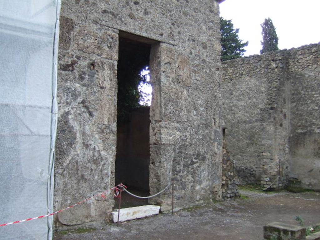 II.2.2 Pompeii. December 2005.  Room 5 in south-east corner (on right) and room “c” (on left) with marble threshold, on east side of atrium.