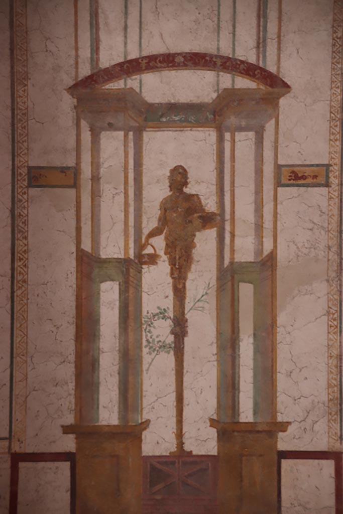 II.2.2 Pompeii. October 2022. 
Room “d”, figure in centre of west wall. Photo courtesy of Klaus Heese