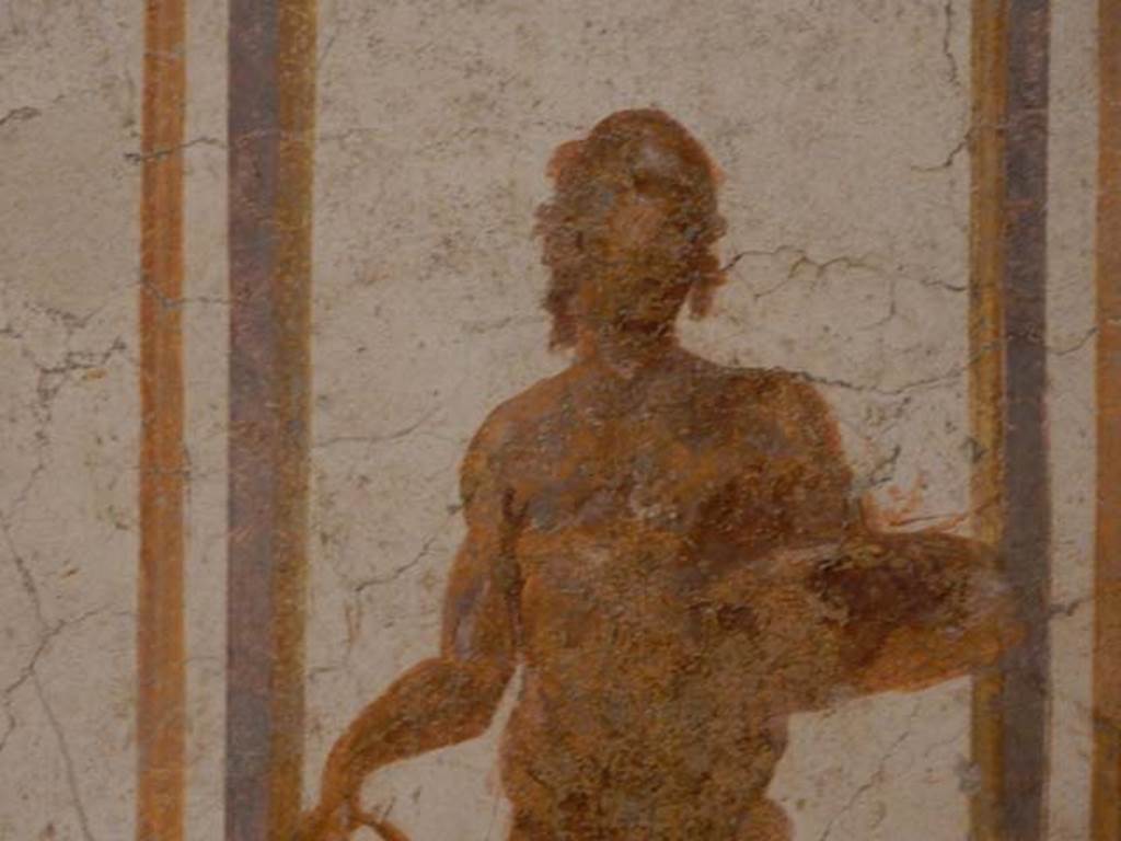 II.2.2 Pompeii. May 2016. Room “d”, detail of figure in centre of west wall. Photo courtesy of Buzz Ferebee.