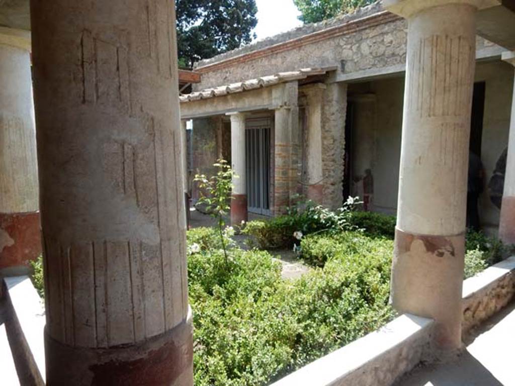 II.2.2 Pompeii. May 2016. Looking south-west across pseudoperistyle “g” towards doorway to room “f”, oecus.
Photo courtesy of Buzz Ferebee.