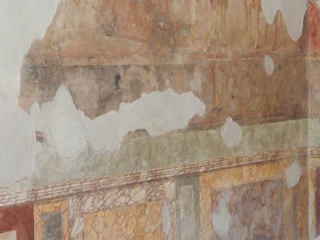 II.2.2 Pompeii. May 2016. Room “h”, west wall, showing narrow frieze above the marbled zoccolo. 
Photo courtesy of Buzz Ferebee.
This shows two combat scenes. On the left is the battle at the wall. Right is the battle at the ships.
See Lorenz K., 2013. In Epic Visions: Visuality in Greek and Latin Epic and its Reception. Cambridge U.P., p. 225.