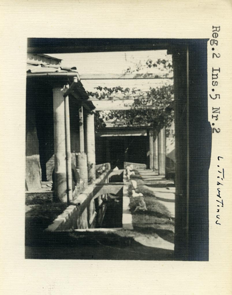 II.2.2 Pompeii. Pre-1937-1939. Room i, looking east along upper euripus.
In the original excavation records this house was known as II.5.2 before it was renumbered.
Photo courtesy of American Academy in Rome, Photographic Archive. Warsher collection no. 393.