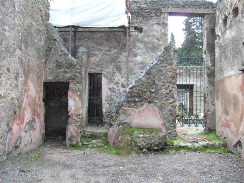 II.2.3 Pompeii. December 2005. Looking south with doorway to small cubiculum, on left.