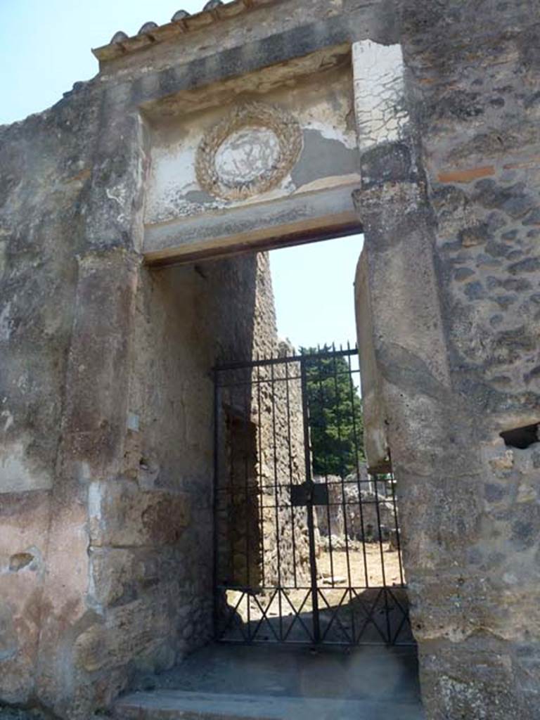 II.2.4 Pompeii. June 2012. Looking across fauces 1 and 2 towards room 3 east side of entrance doorway. Photo courtesy of Michael Binns.