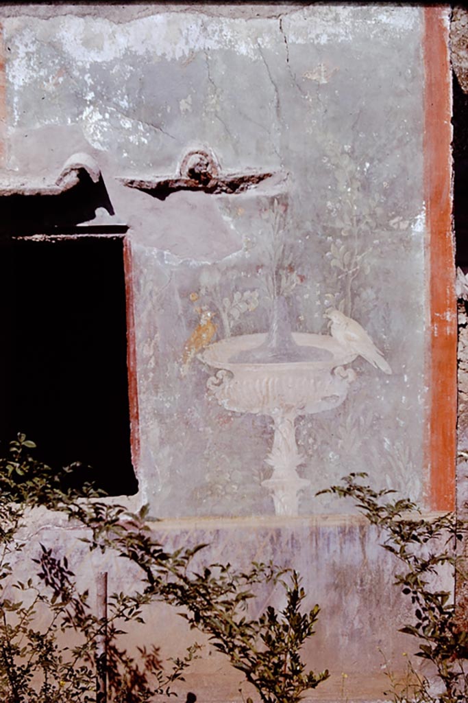 II.3.3 Pompeii. 1961. 
Room 11, painted panel with bird on a fountain on exterior wall of room 10. Photo by Stanley A. Jashemski.
Source: The Wilhelmina and Stanley A. Jashemski archive in the University of Maryland Library, Special Collections (See collection page) and made available under the Creative Commons Attribution-Non Commercial License v.4. See Licence and use details.
J61f0760