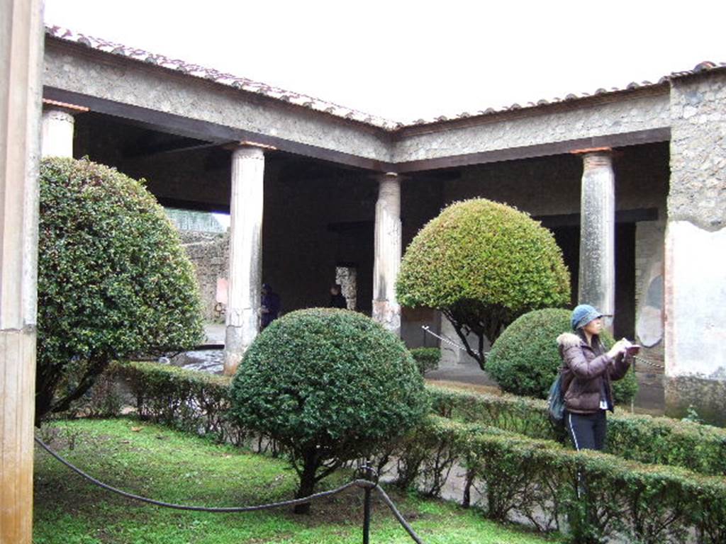 II.3.3 Pompeii. December 2006. Room 11, looking north-east across peristyle garden.