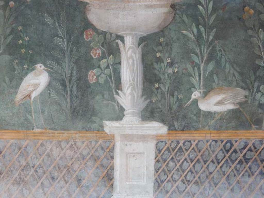 II.3.3 Pompeii. May 2016. Room 11, detail of base of fountain, birds and trellis fence. 
Photo courtesy of Buzz Ferebee.