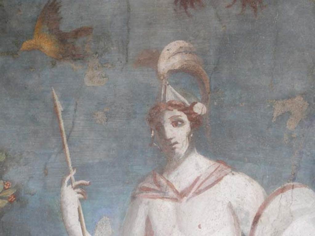 II.3.3 Pompeii. May 2016. Room 11, east panel on south wall of peristyle. Detail of upper  part of statue of naked Ares / Mars with a lance and shield. Photo courtesy of Buzz Ferebee.