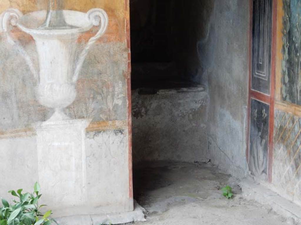 II.3.3 Pompeii. May 2016. Detail from base of wall and doorway. Photo courtesy of Buzz Ferebee.