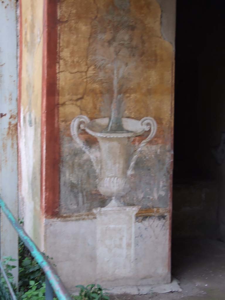II.3.3 Pompeii. December 2006. 
Room 17, exterior west side of sacellum. Wall painting of crater, fountain and tree.