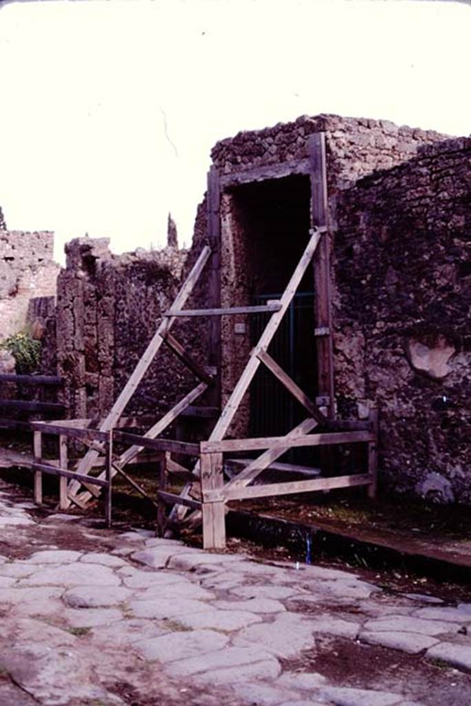 II.3.3 Pompeii, 1982 or 1983. Looking towards entrance doorway on south side of Via dell’Abbondanza.   
Source: The Wilhelmina and Stanley A. Jashemski archive in the University of Maryland Library, Special Collections (See collection page) and made available under the Creative Commons Attribution-Non Commercial License v.4. See Licence and use details. J80f0461