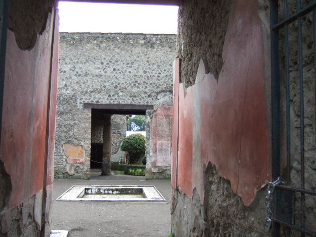 II.3.3 Pompeii. December 2004. Room 1, entrance corridor or fauces, looking south across atrium.
