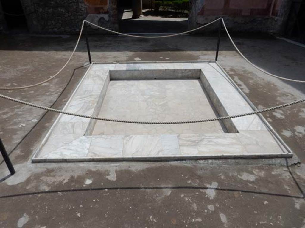 II.3.3 Pompeii. May 2016. Room 2, atrium. Looking south across impluvium.  Photo courtesy of Buzz Ferebee.
