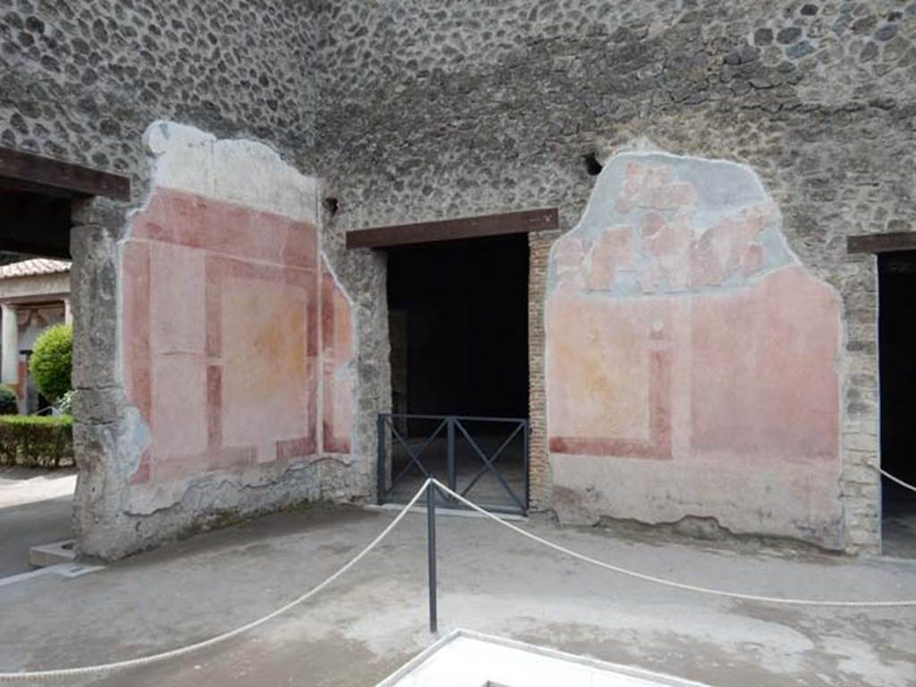 II.3.3 Pompeii. May 2016.  Room 2, south-west corner of atrium with doorway to room 5 in centre. 
Photo courtesy of Buzz Ferebee.