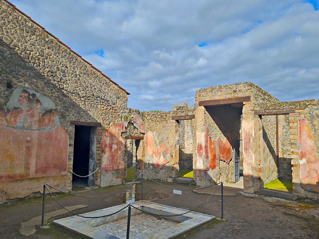 II.3.3 Pompeii. March 2024. 
Room 2, looking across impluvium in atrium towards north-west corner. Photo courtesy of Giuseppe Ciaramella.