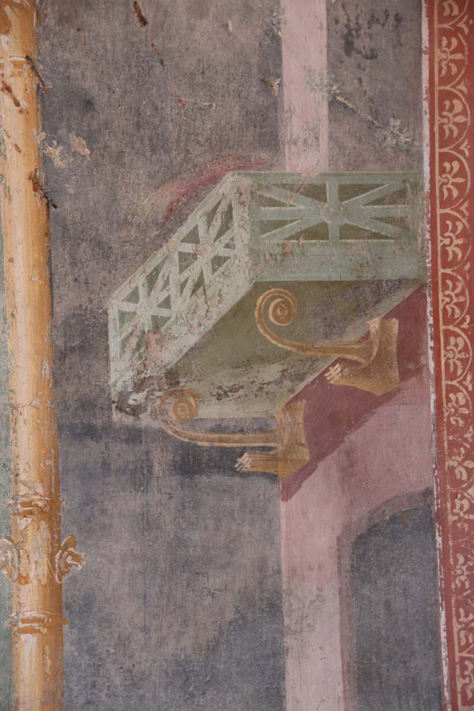 II.3.3 Pompeii. September 2017. Room 6, detail of painted balcony from west end of centre of south wall of triclinium. 
Photo courtesy of Klaus Heese.