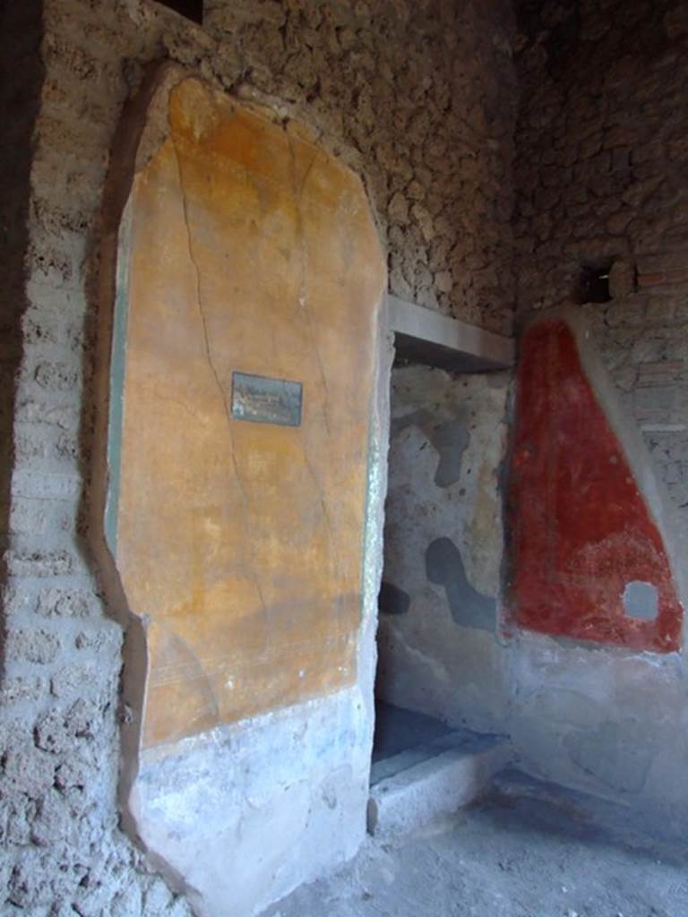 II.3.3 Pompeii.  March 2009.  Wall in north east corner of Room 11, and Doorway to Room 8,