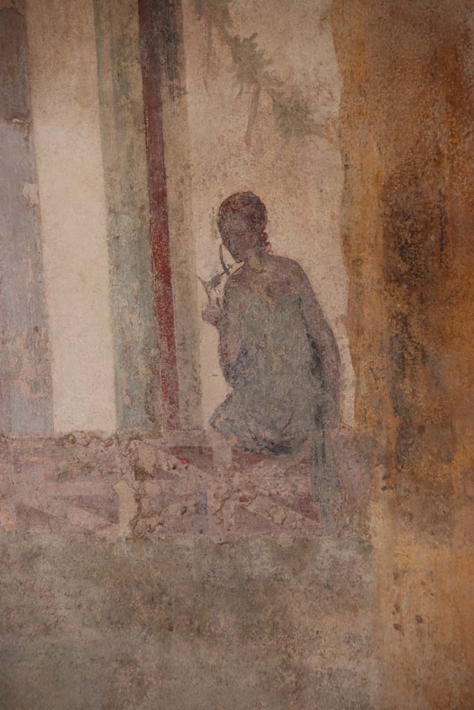 II.3.3 Pompeii. September 2017. Room 9, figure on south wall of oecus. 
Photo courtesy of Klaus Heese.