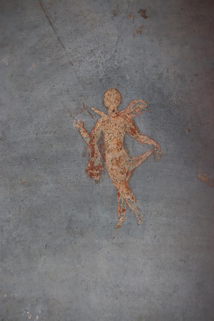 II.3.3 Pompeii. October 2022. 
Room 10, detail of flying cherub from south wall. Photo courtesy of Klaus Heese
